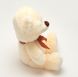 М'яка іграшка плюшевий Ведмедик бежевого кольору, довжиною 30 см.