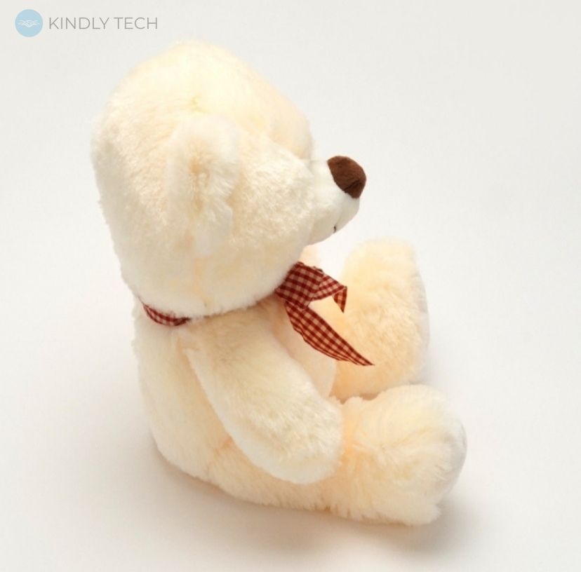 Мягкая игрушка плюшевый Мишка бежевого цвета, длиной 30 см.